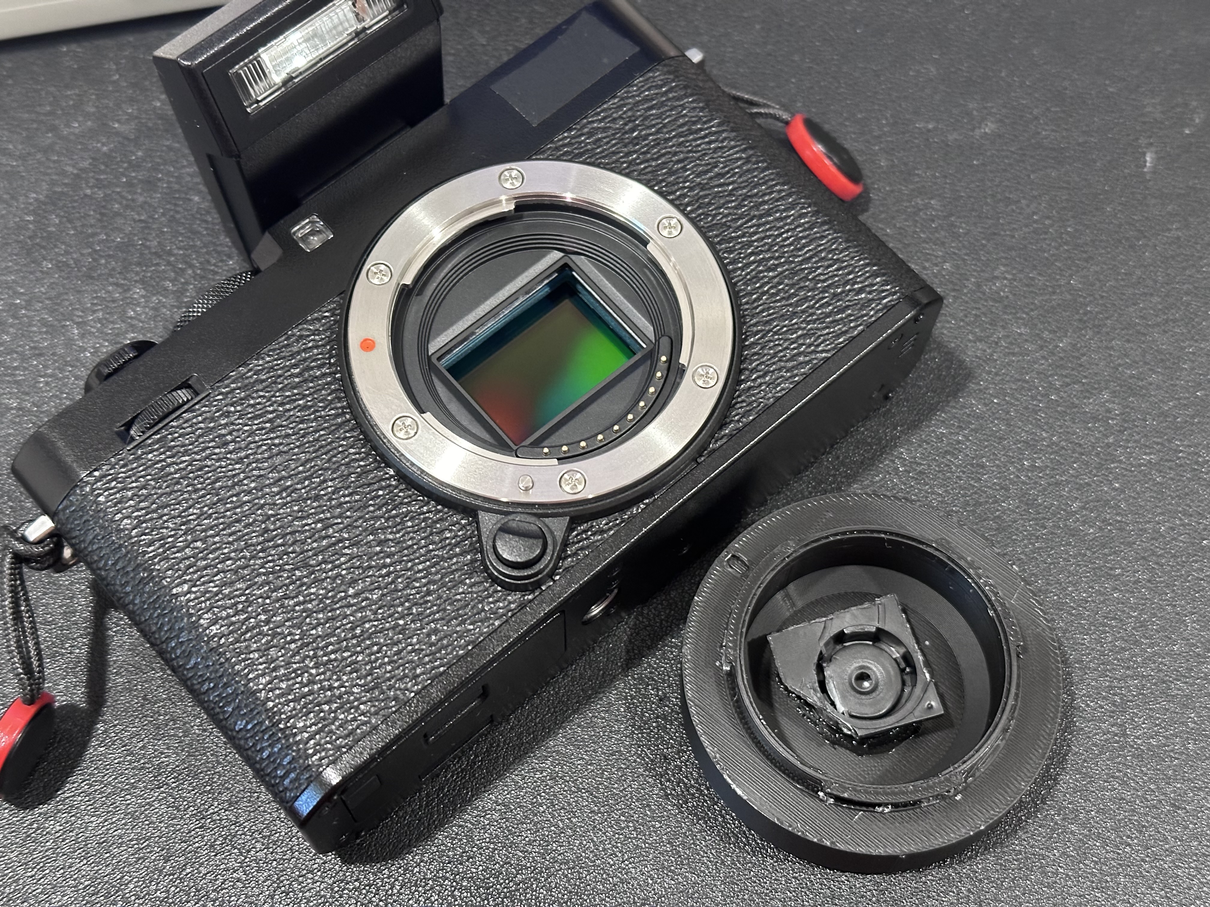 X-E4 with disposable lens adapter